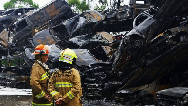 Fire destroyed about 100 cars at Pickles Auctions in Milperra. 