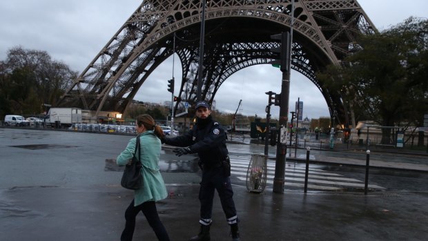 Police clear the Eiffel Tower in Paris on Tuesday. 