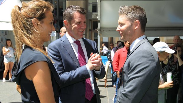 Sally Fitzgibbons, NSW Premier Mike Baird and Michael Clarke at the launch of the surfer's foundation on Friday.