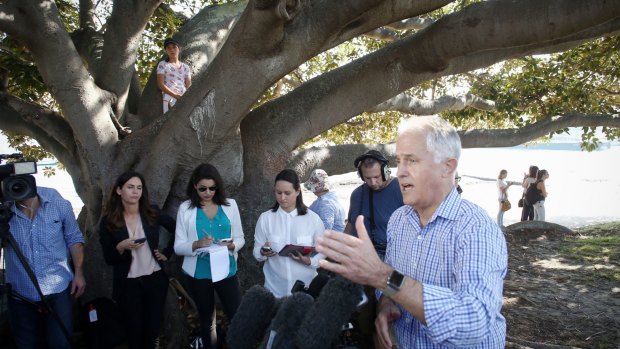 Prime Minister Malcolm Turnbull during a press conference under a tree he played in as a child after he visited the Taste Orange food and wine festival in his electorate.