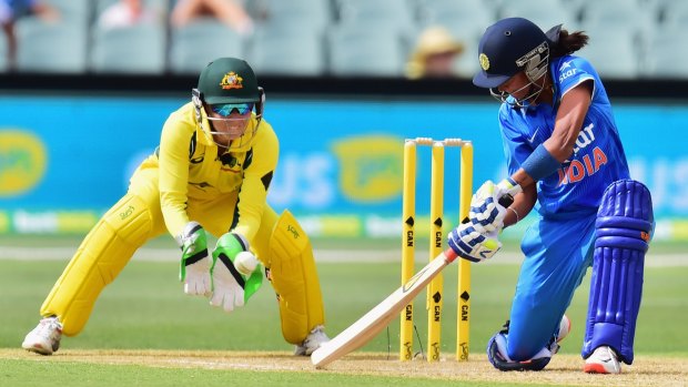 Grand contest: Harmanpreet Kaur of India played the pivotal innings with 46 from 31 balls.