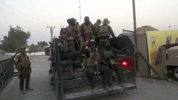 Iraq's elite counter-terrorism forces arrive to join the forces surrounding Fallujah on Friday. 