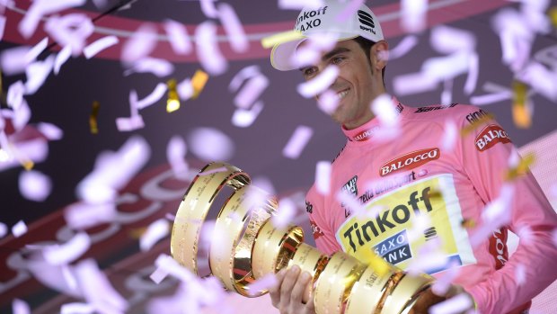 Tinkoff-Saxo rider Alberto Contador celebrates his second     Giro d'Italia win.