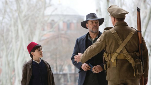 Joshua Connor (Russell Crowe) and Orhan (Dylan Georgiades) in a scene from <i>The Water Diviner.</i>