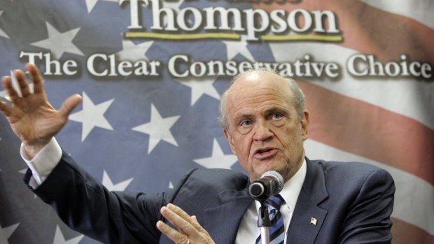 Fred Thompson gestures as he fields questions during a talk radio show in 2008.
