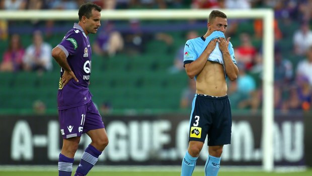 Wilting: Richard Garcia and Alex Gersbach look spent during the round seven A-League match between Perth Glory and Sydney FC at nib Stadium.