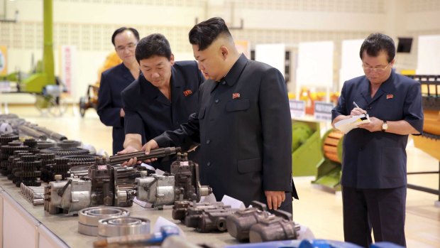 Kim Jong-un looks at things.