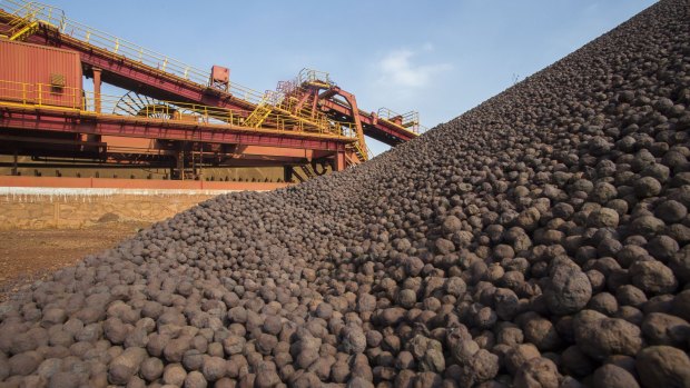 Iron ore prices have slumped by more than half in the past year.
