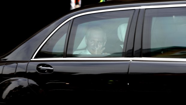 Heading off: Vladimir Putin departs the Hilton Hotel after his G20 visit to Brisbane. 