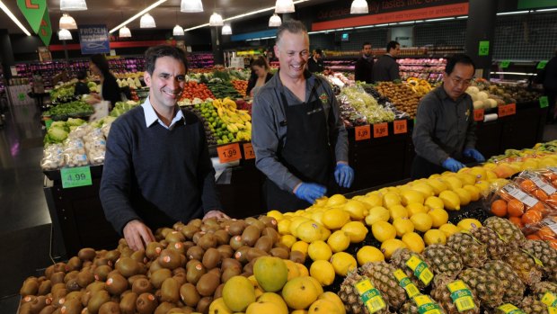 Theo Koundouris, left, at the Canberra Centre Supabarn store which has now been bought out by Coles.
