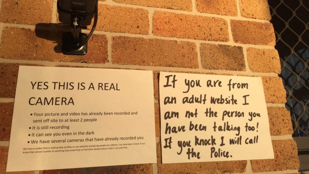 Signs and security put up by Mrs Night and her husband in response to dozens of visits from men expecting sex.