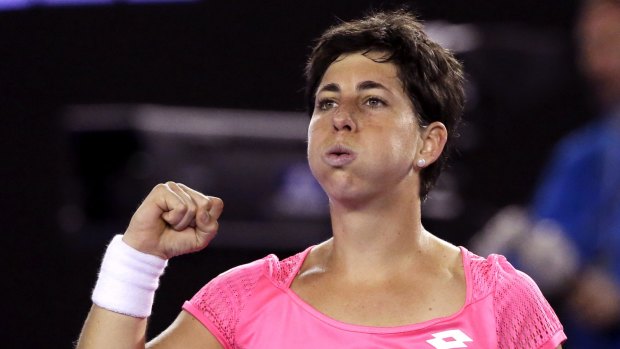 Winning way: Carla Suarez Navarro of Spain celebrates after beating Australia's Daria Gavrilova.