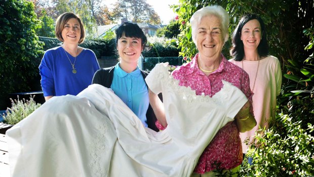 Something borrowed: (left to right) Penny Jenkins, her daughter Sarah Jenkins, Annette McClure and Jenny Hartley. Sarah will be the fourth family member to wear the wedding dress that was made for Annette in 1960. 