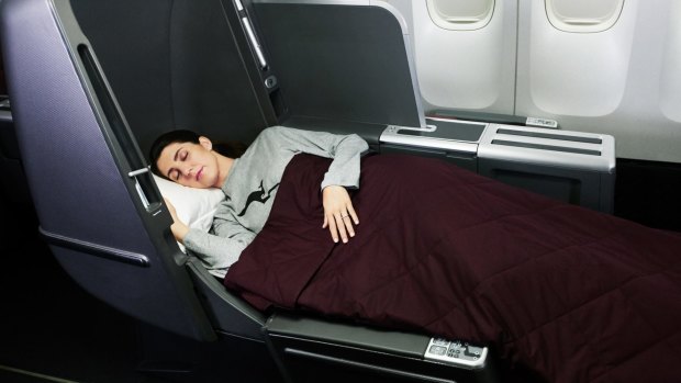 The new system will give flyers who book an economy class award a shot at an upgrade to business class' upgraded seating.