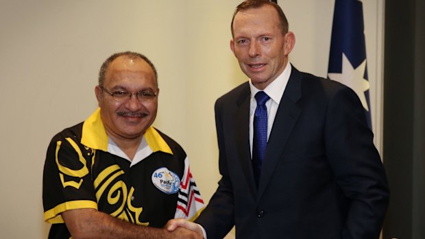 Then prime minister Tony Abbott meets PNG leader Peter O'Neill in September 2015.