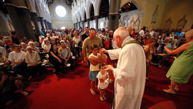 Father Bob's final Mass with a capacity gathering at St Peter and Paul's Church in South Melbourne on January 29, 2012. 
