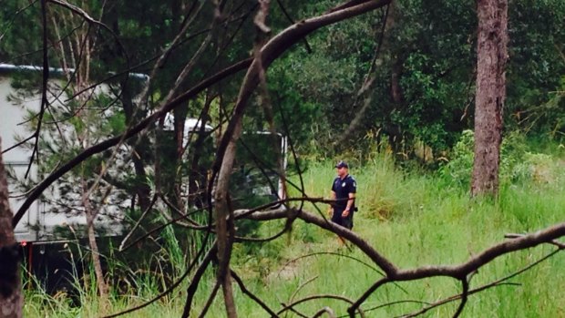 Police search for property in the Gold Coast Hinterland.