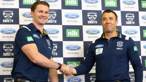 Smooth changeover: Patrick Dangerfield shakes hands with Geelong coach Chris Scott.