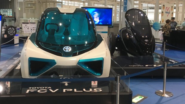 Toyota's new hydrogen-powered fuel cell vehicles on display in Daiba, Tokyo.