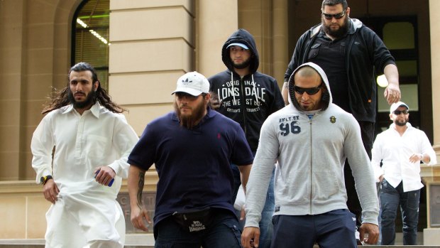 Islamic State terrorists Mohamed Elomar, left, and Khaled Sharrouf, second from left,  attend one of Ahmad Elomar's court appearances in 2012.