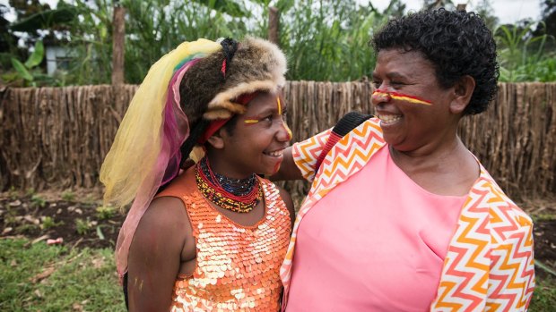 Doreen Pipiki, right, with her daughter Marianne-David at Kuluanda Primary School in Hela province, PNG.