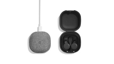 The Pixel Buds in their charging case.