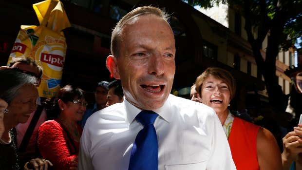 Prime Minister Tony Abbott takes a stroll through Chinatown at lunchtime on Sunday.