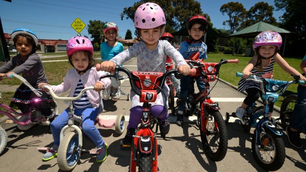 Helmets on: children learning to ride at Essendon Traffic School.