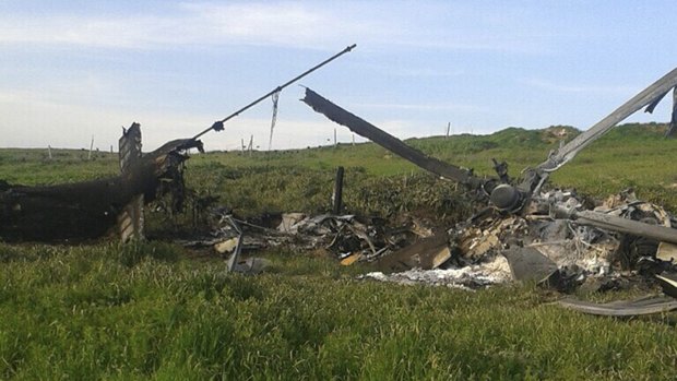 Remains of a downed Azerbaijani forces helicopter lies in a field in the separatist Nagorno-Karabakh region.