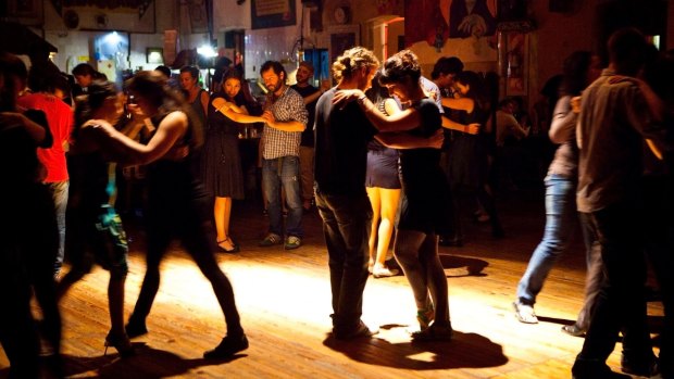 Aspiring tango dancers practise their moves in La Catedral hall in Buenos Aires.