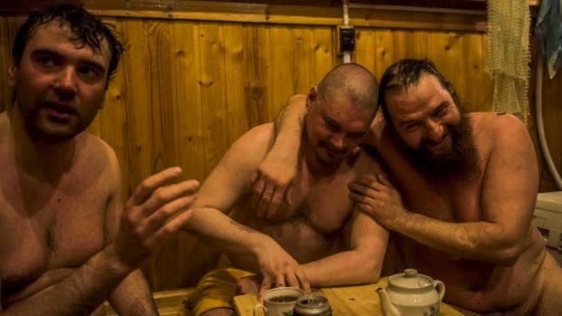 Russian winter expedition crew in the banya, or sauna, at the Bellingshausen Antarctica base.