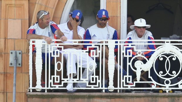 England assistant coach Paul Farbrace, captain Alastair Cook, batting coach Mark Ramprakash and coach Trevor Bayliss watch the carnage.
