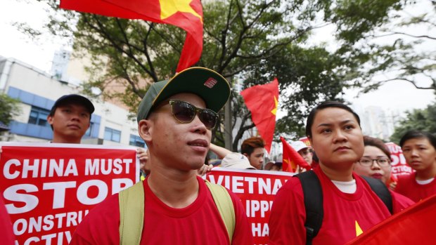 Vietnamese expatriates at a rally held last Thursday at the Chinese consulate in Manila to protest China's island-building and deployment of surface-to-air missiles in the South China Sea