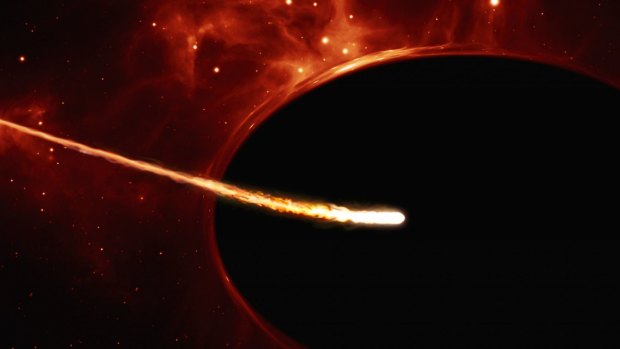 This artist's impression depicts a sun-like star close to a rapidly spinning supermassive black hole, with a mass of about 100 million times the mass of the sun.