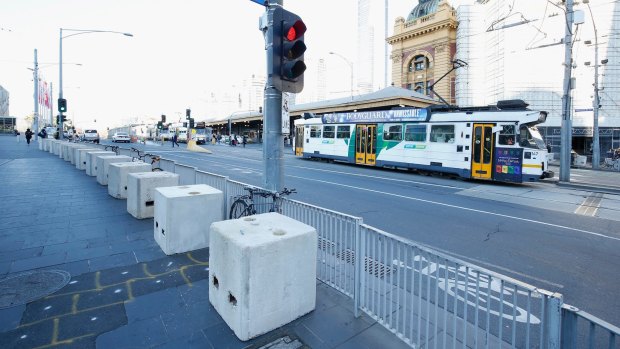 Bollards outside Federation Square and Flinders Street Station.