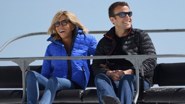 Emmanuel Macron and his wife Brigitte catch a chairlift to lunch during a campaign visit in Bagneres-de-Bigorre, south-western France. 