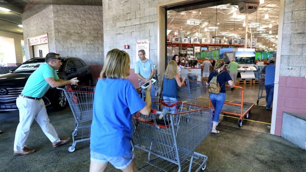 Shoppers arrive at the Costco store in Altamonte Springs, Florida to stock up on supplies.