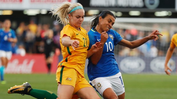 Australia's Ellie Carpenter fights for the ball against Brazil's Marta Vieira during their friendly last month. 