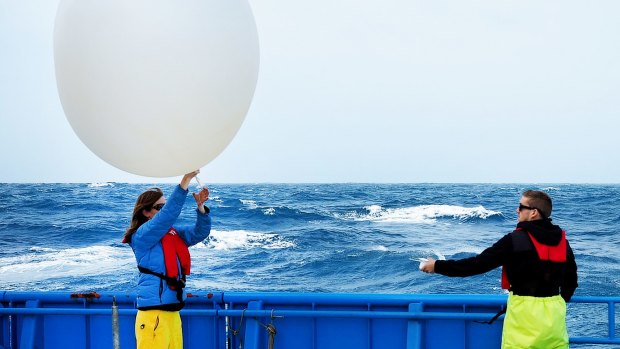 No thought bubble: Deploying weather balloons from RV Investigator.  