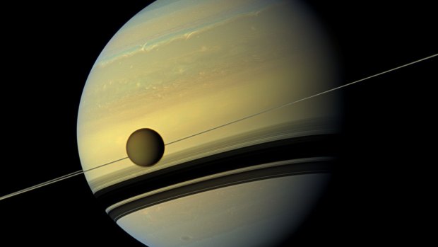 Saturn and its biggest moon Titan seen from NASA's Cassini spacecraft.