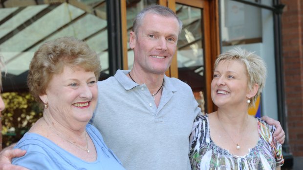Gordon Wood, pictured with his family after being acquitted in 2012 of the murder of his girlfriend, Caroline Byrne.