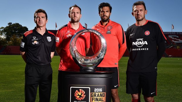 Champions in waiting: Adelaide coach Guillermo Amor and captain Eugene Galekovic eye the spoils of victory with Wanderers counterparts Nikolai Topor-Stanley and Tony Popovic.