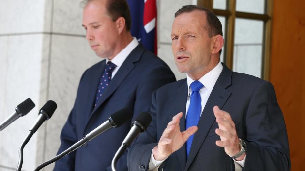 Prime Minister Tony Abbott, pictured with Health Minister Peter Dutton, has conceded the government's planned $7 GP fee will have little hope of passing the Senate.