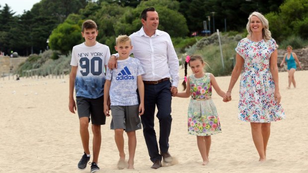 WA's new Premier Mark McGowan on Rockingham Beach with wife Sarah and children Samuel (13), Alexander (11) and Amelkia (7) savour the moment on Sunday. 