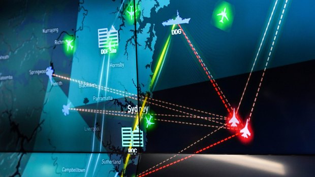 A simulator at Lockheed Martin's STELaRLab in Melbourne shows how an Aegis-equipped destroyer could help intercept an attack. 