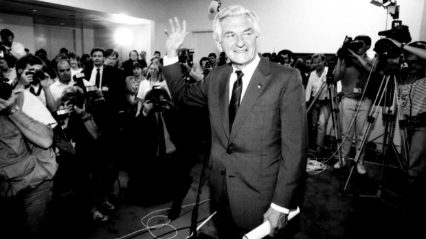 Former prime minister Bob Hawke waves goodbye to the media at Parliament House, Canberra after being defeated in a challenge for the leadership from Paul Keating on December 19, 1991. 