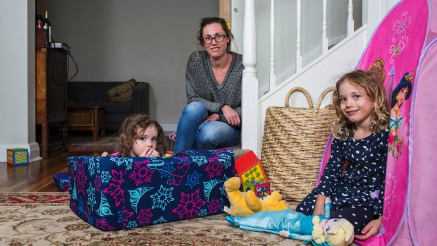 Stephanie Purvis at home with her two daughters, Matilda, 2, left, and Emily, 5.