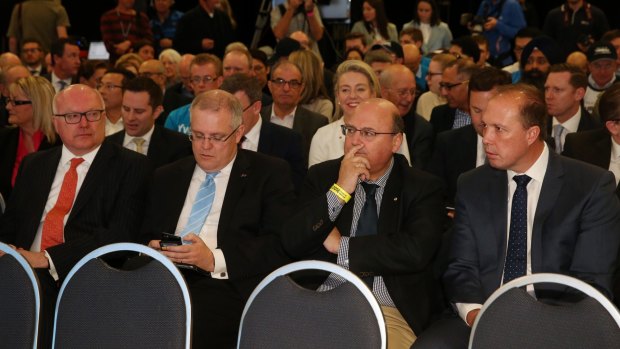 Turnbull ministers Peter Dutton (right) and Senator George Brandis, Scott Morrison, Senator Arthur Sinodinos before the the Coalition national campaign rally.
