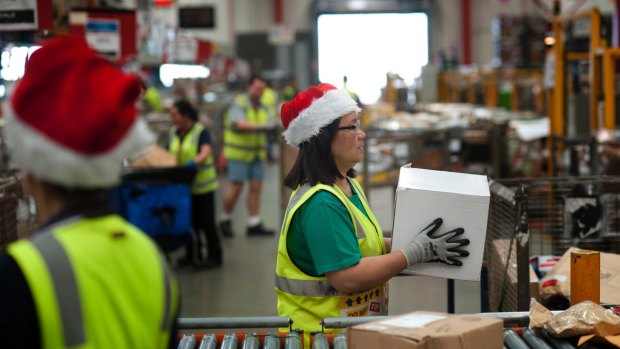 Australia Post mail depot in Sunshine as staff send out Christmas packages. 