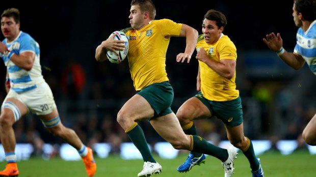 Drew Mitchell makes a break which leads to his side's fourth try scored by Adam Ashley-Cooper.